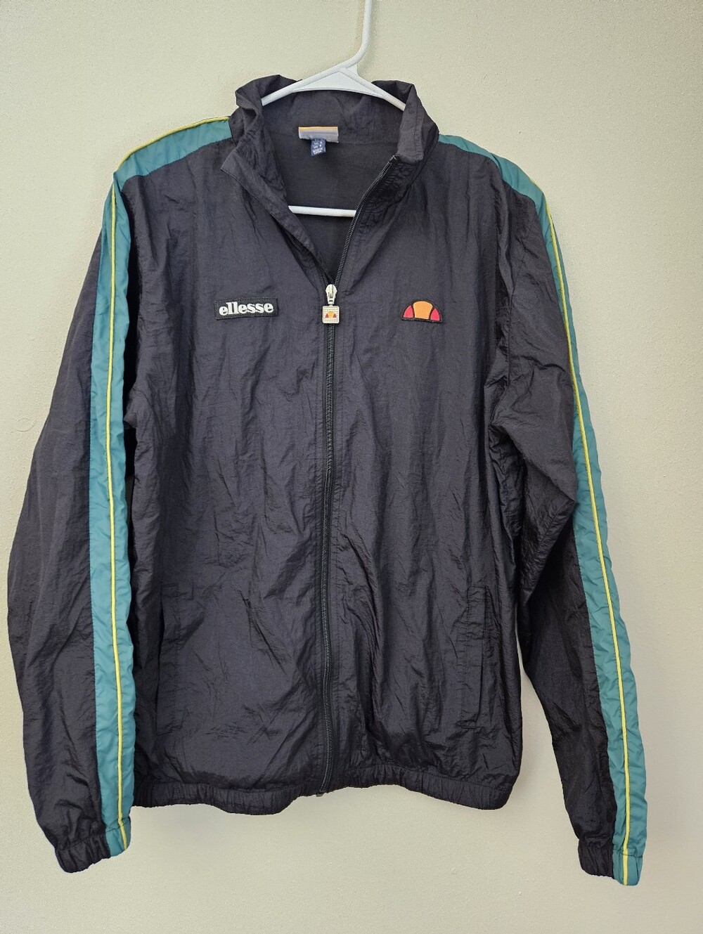 NWOT. Ellesse Fiastra Black Windbreaker Track Jacket Men’s Size S